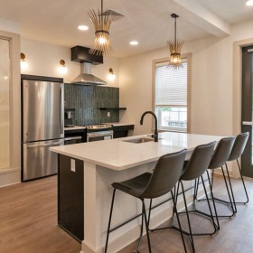 A perfect fit for the whole family a kitchen with a table and chairs
