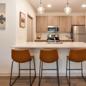 The essence of exceptional living a kitchen with a dining table